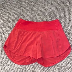 speed up mid-rise short 4" in carnation red